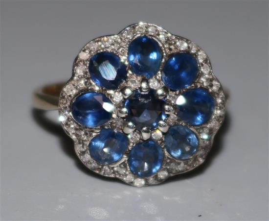 A 15ct gold Victorian style sapphire and diamond cluster ring, size K.